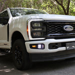 2023 Ford Super Duty Fog Lights installed on a white Ford F250, showcasing enhanced visibility and modern design.