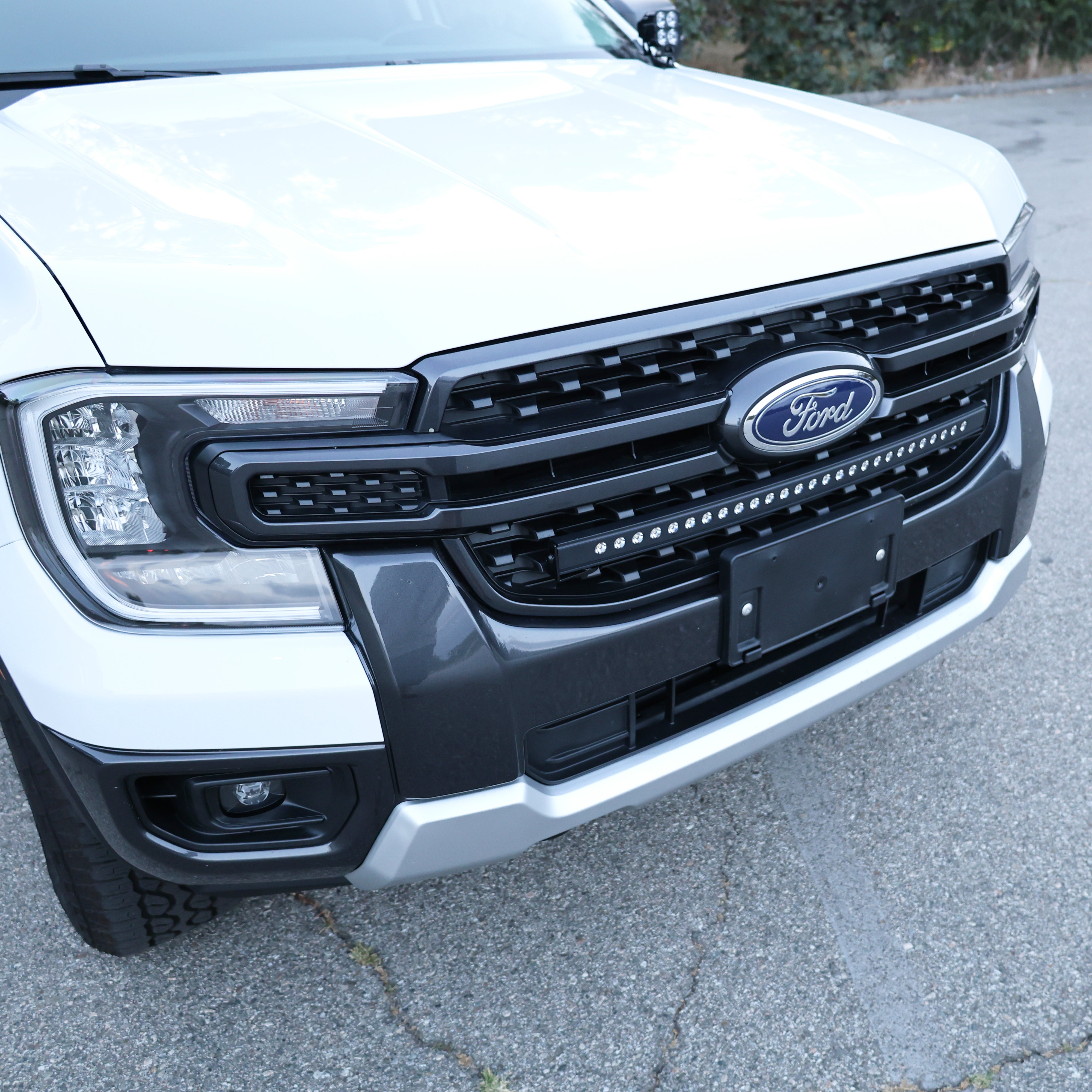 30-inch SLIM LED light bar mounted in the factory grille opening of a new Ford Ranger