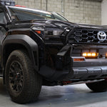4Runner Light Bars installed on black 2025 Toyota 4Runner front bumper with amber LED light bars illuminated