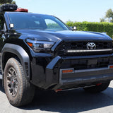 4Runner Ditch lights dual color LED ditch and light bar kit on 2025 Toyota 4Runner front view on road