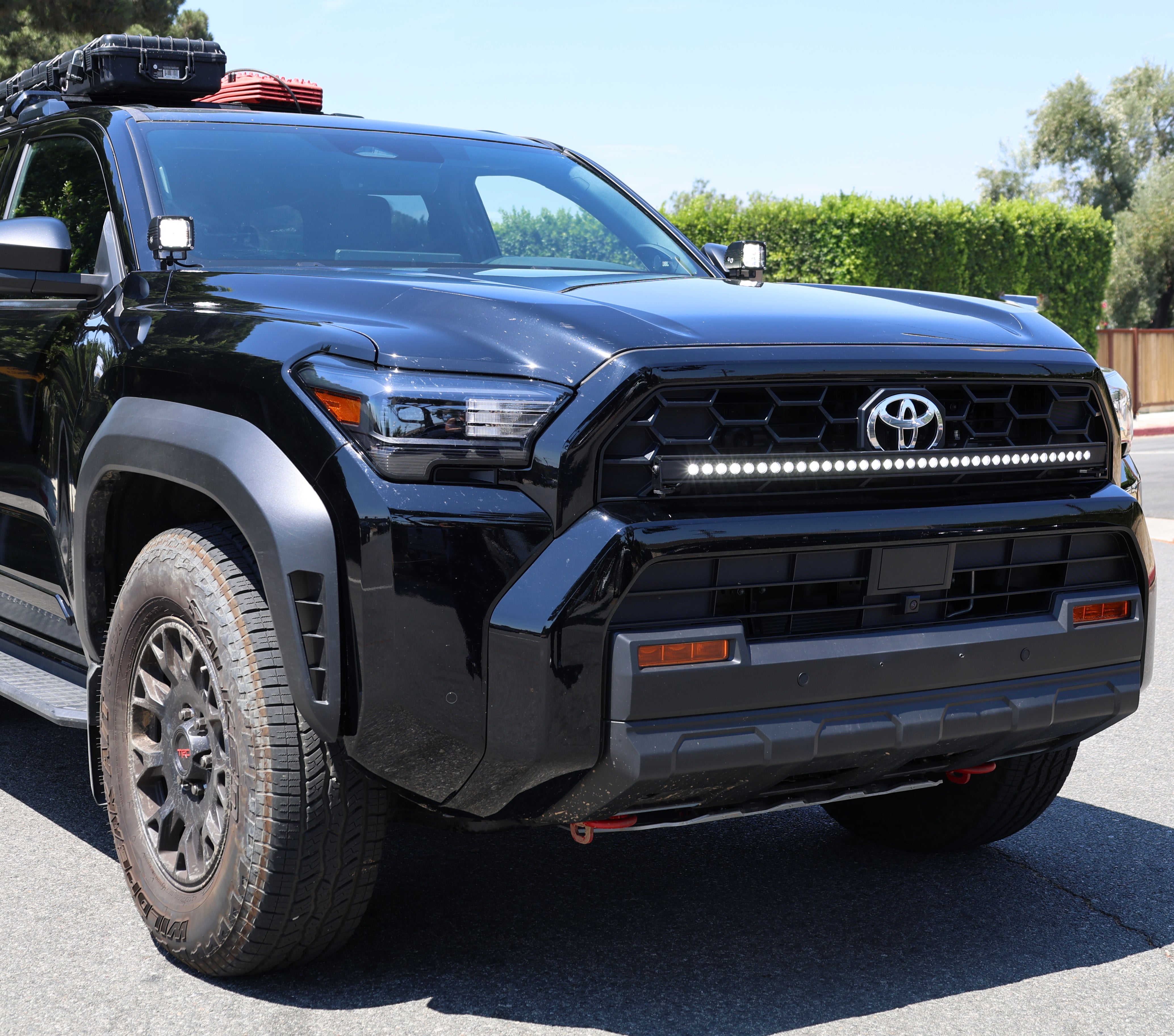 4Runner Ditch lights dual color LED ditch and light bar kit on 2025 Toyota 4Runner front view on road