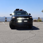 4Runner Light Bar PRO 40in curved LED grille mount on 2025 Toyota 4Runner TRD Off-Road SUV front view on mountain road