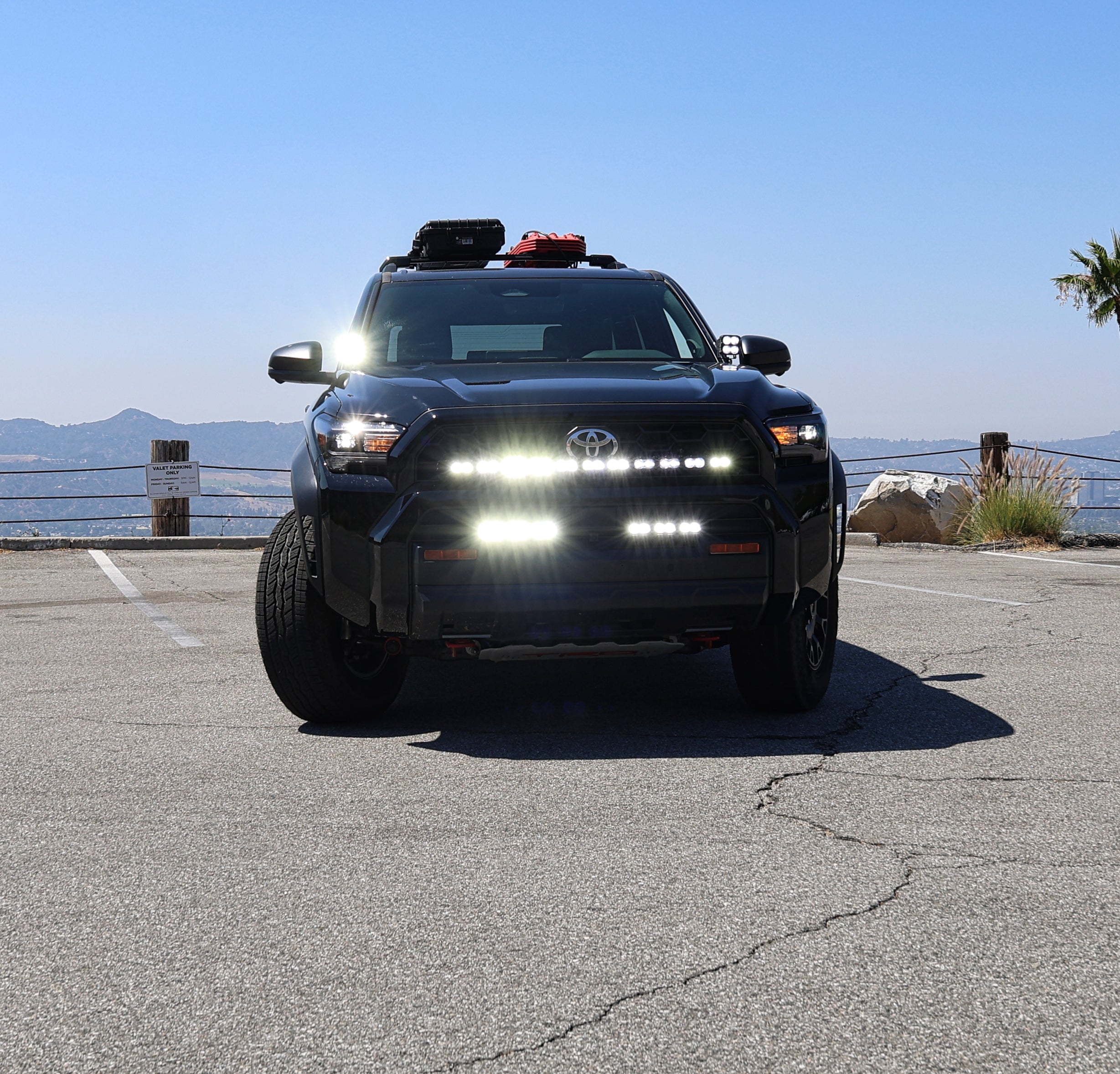 4Runner Light Bar PRO 40in curved LED grille mount on 2025 Toyota 4Runner TRD Off-Road SUV front view on mountain road