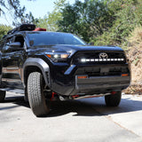 4Runner Light Bar PRO 40in curved LED grille light bar on black 2025 Toyota 4Runner TRD Off-Road parked on forest road