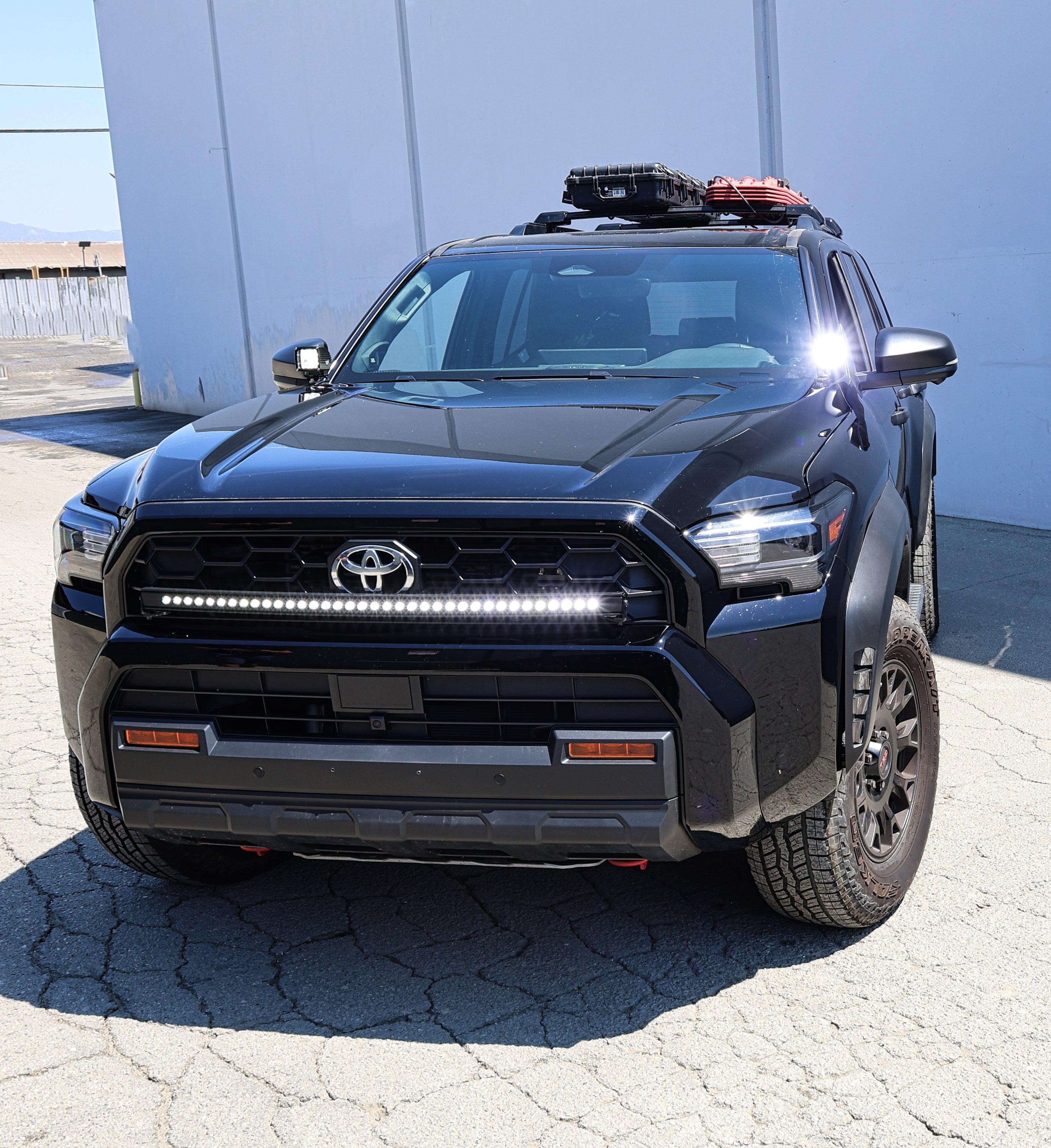 4Runner Ditch lights on black 2025 Toyota 4Runner with dual color amber DRL ditch lighting upgrade