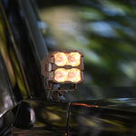 Amber dual color 4Runner Ditch lights mounted on 2025 Toyota 4Runner side mirror for off-road visibility