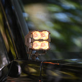 Amber dual color 4Runner Ditch lights mounted on 2025 Toyota 4Runner side mirror for off-road visibility