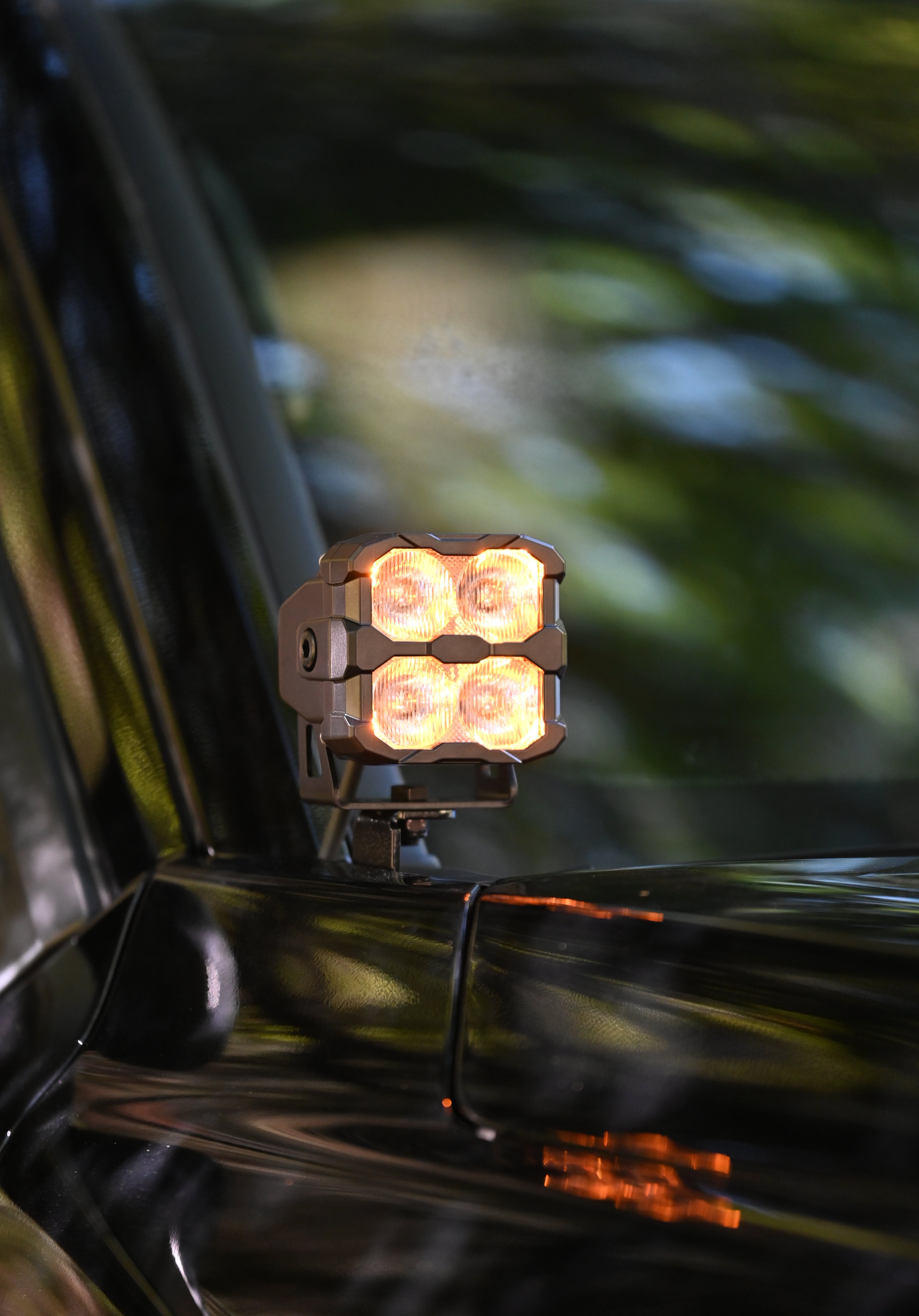Amber dual color 4Runner Ditch lights mounted on 2025 Toyota 4Runner side mirror for off-road visibility