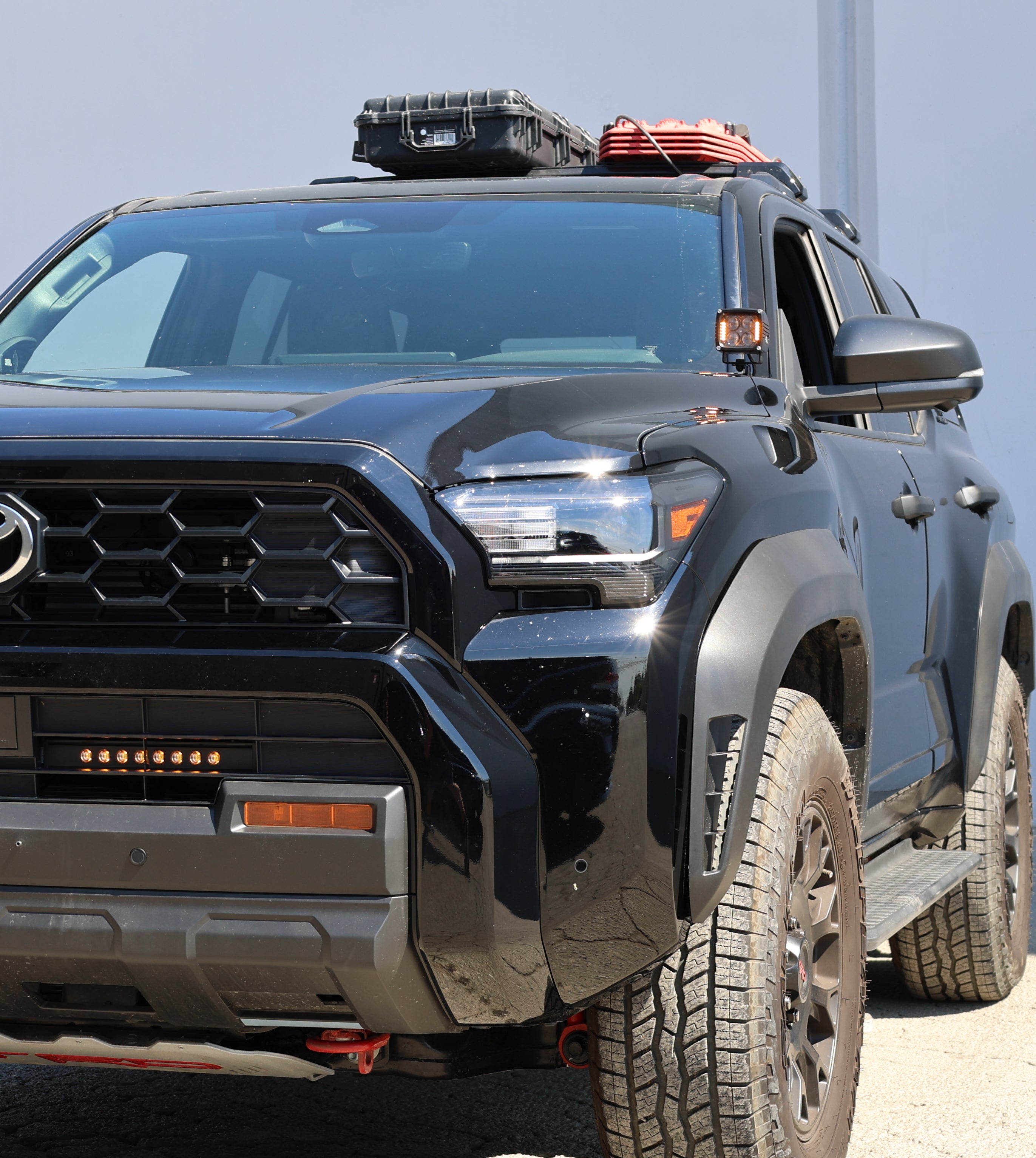 4Runner Ditch lights dual color LED ditch lights on 2025 Toyota 4Runner front driver side view