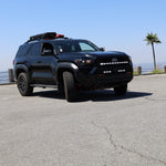 4Runner Light Bar PRO curved 40in front grille mount on black 2025 Toyota 4Runner TRD parked outdoors