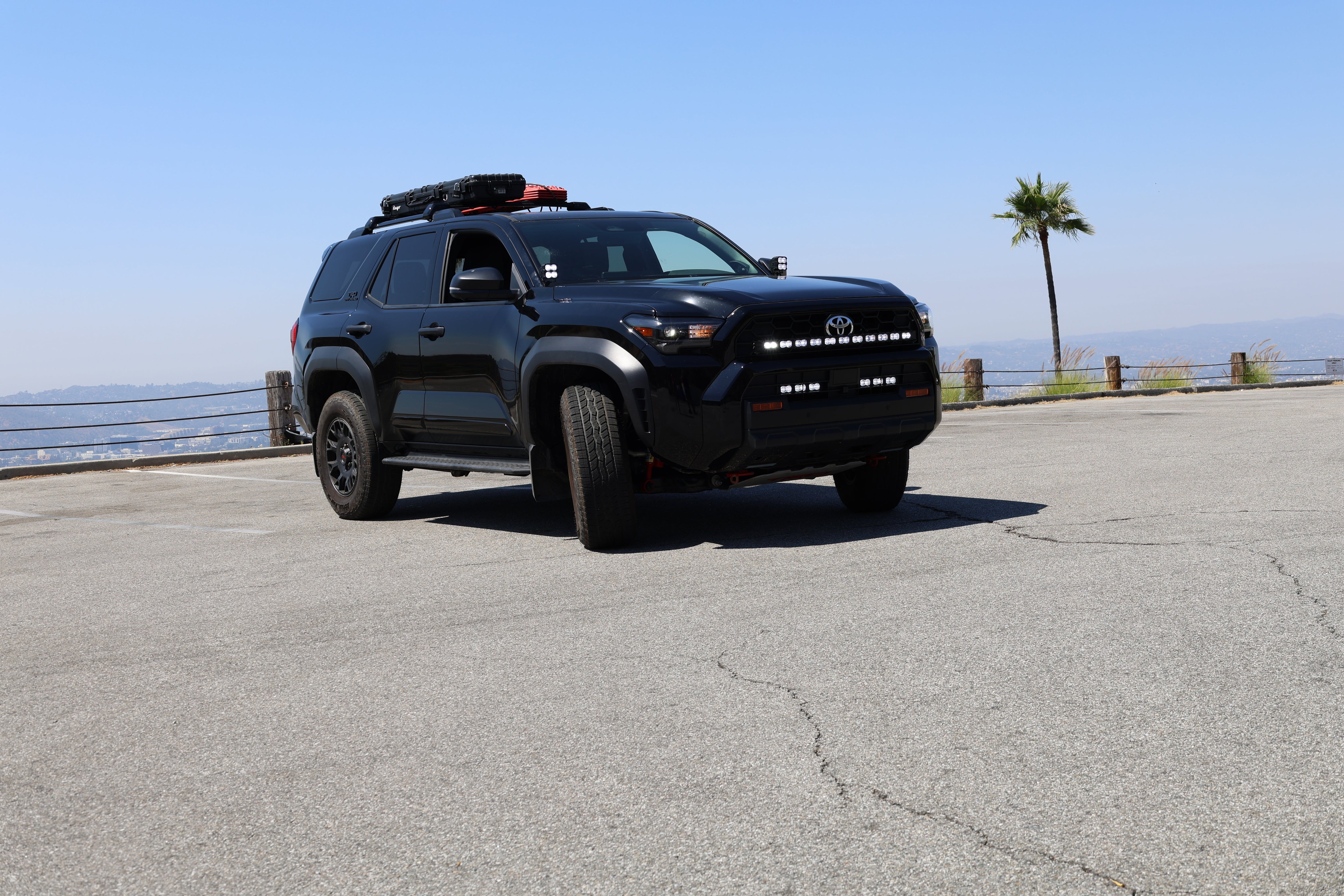 4Runner Light Bar PRO curved 40in front grille mount on black 2025 Toyota 4Runner TRD parked outdoors