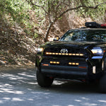 4Runner Light Bar PRO 40in curved LED on 2025 Toyota 4Runner off-road SUV driving through forest road