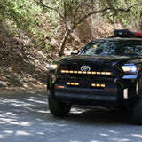 4Runner Light Bar PRO 40in curved LED on 2025 Toyota 4Runner off-road SUV driving through forest road