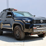 4Runner Light Bars installed on black 2025 Toyota 4Runner with slim 11in LED grille light bars shown from front side view