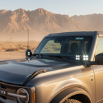 Bronco Raptor Ditch Lights - PRO on Ford Bronco Raptor with dual color white LED and amber DRL backglow in desert setting