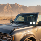 Bronco Raptor Ditch Lights - PRO on Ford Bronco Raptor with dual color white LED and amber DRL backglow in desert setting
