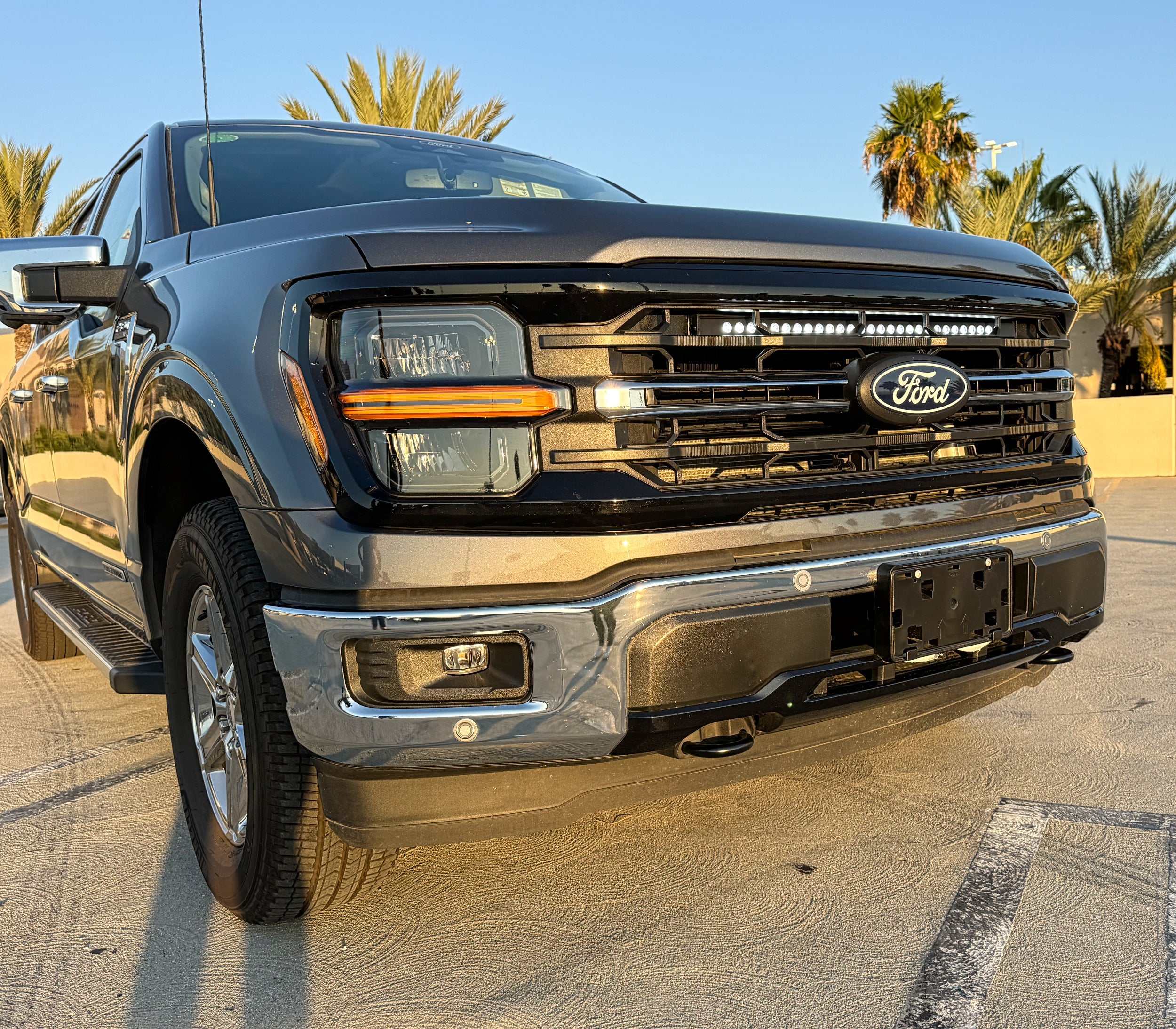 2024+ Ford F150 LightBar image of a Ford F-150 with a front grille and light bar, no cutting or drilling, bolt-on install for 2024-2026 Ford F150, grille removal required