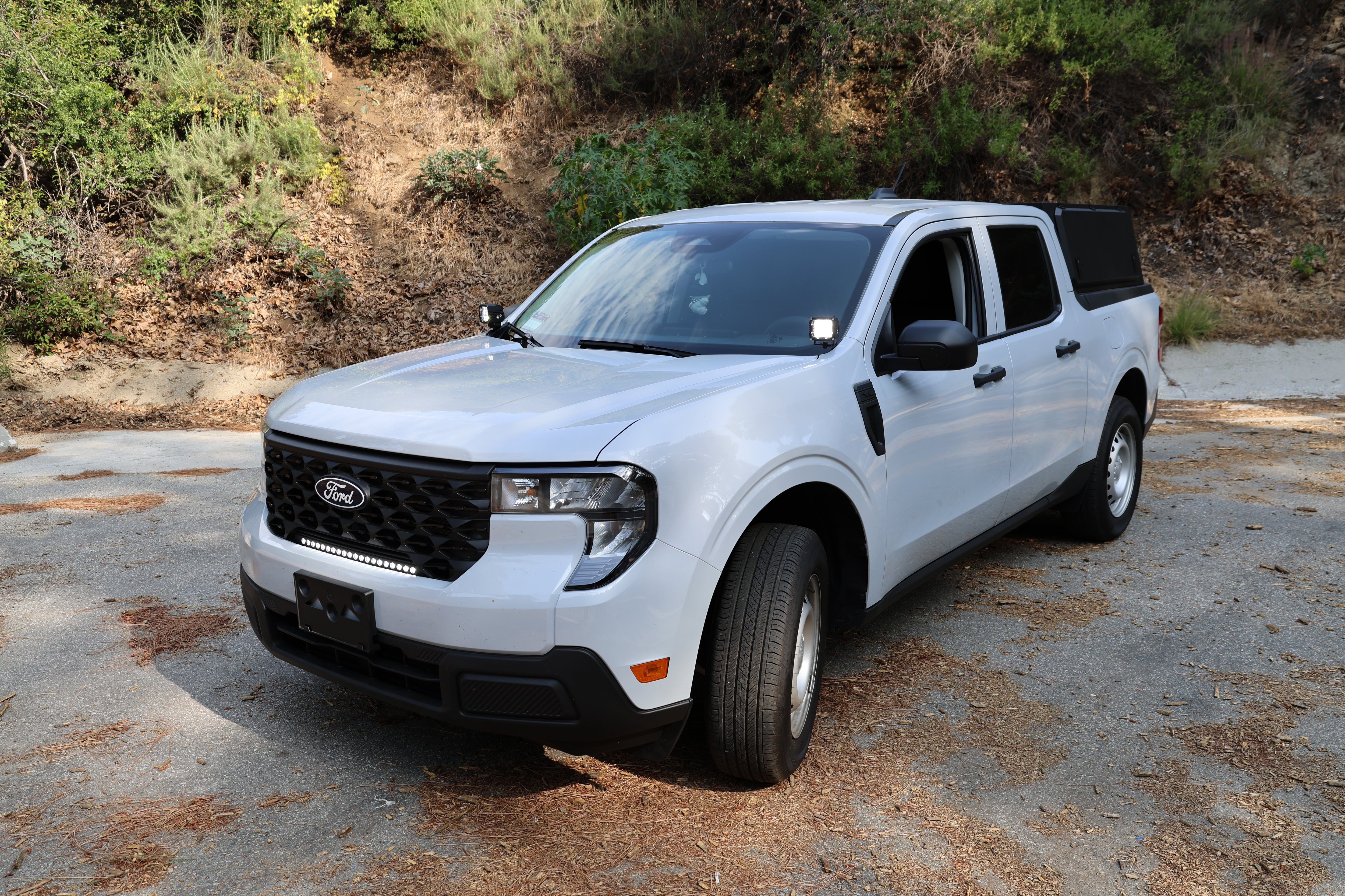 Ford Maverick Ditch Lights installed on 2025+ Ford Maverick pickup truck showcasing dual color amber DRL backglow