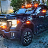 2020 2021 2022 2023 black GMC Sierra 2500/3500HD two amber 40in light bars behind the grille