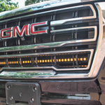 GMC Yukon 2021-24 Single 40in Light Bar installed under GMC logo on the front grille of a black GMC Yukon.