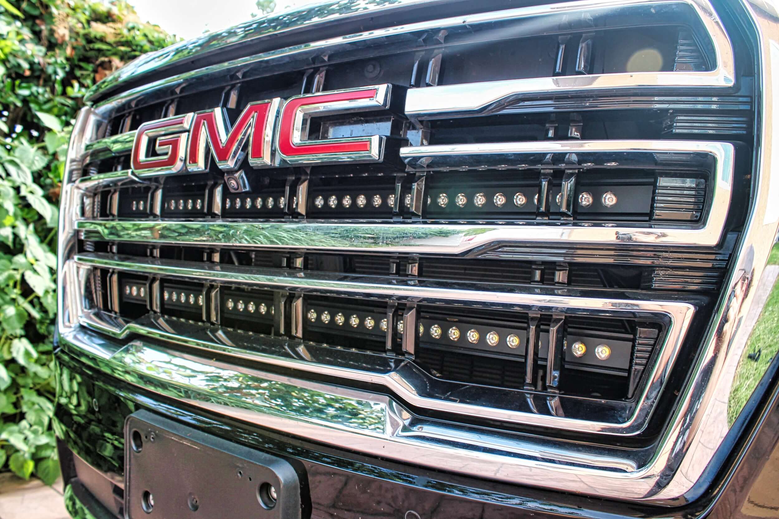 GMC Yukon 2021-24 Single 40in Light Bar - SLIM installed below GMC logo on vehicle grille.