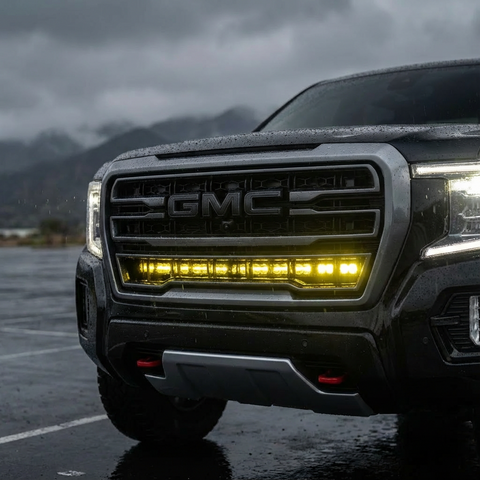 GMC Yukon 40in Light Bar - F150 Raptor Modular Bumper 40in Light Bar 2021-2024 PRO on GMC Yukon vehicle with LED light bar behind grille