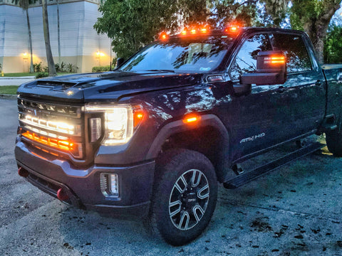 2020 2021 2022 2023 black GMC Sierra 2500 and 3500HD two 40in Light Bars behind the grille color amber and white 