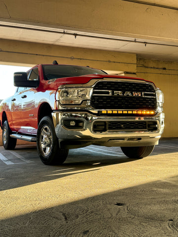 red ram 2500 3500 heavy duty with light bar on top of bumper for off roading