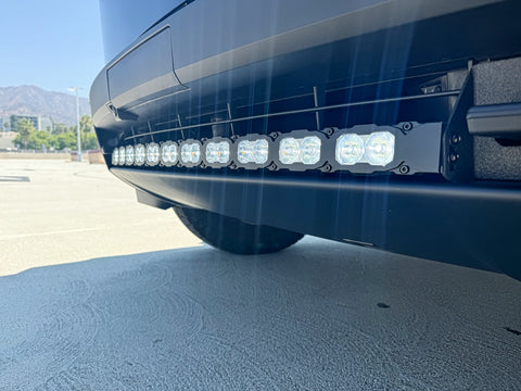 close up black tesla cybertruck with white curved LED light bar m&r automotive 