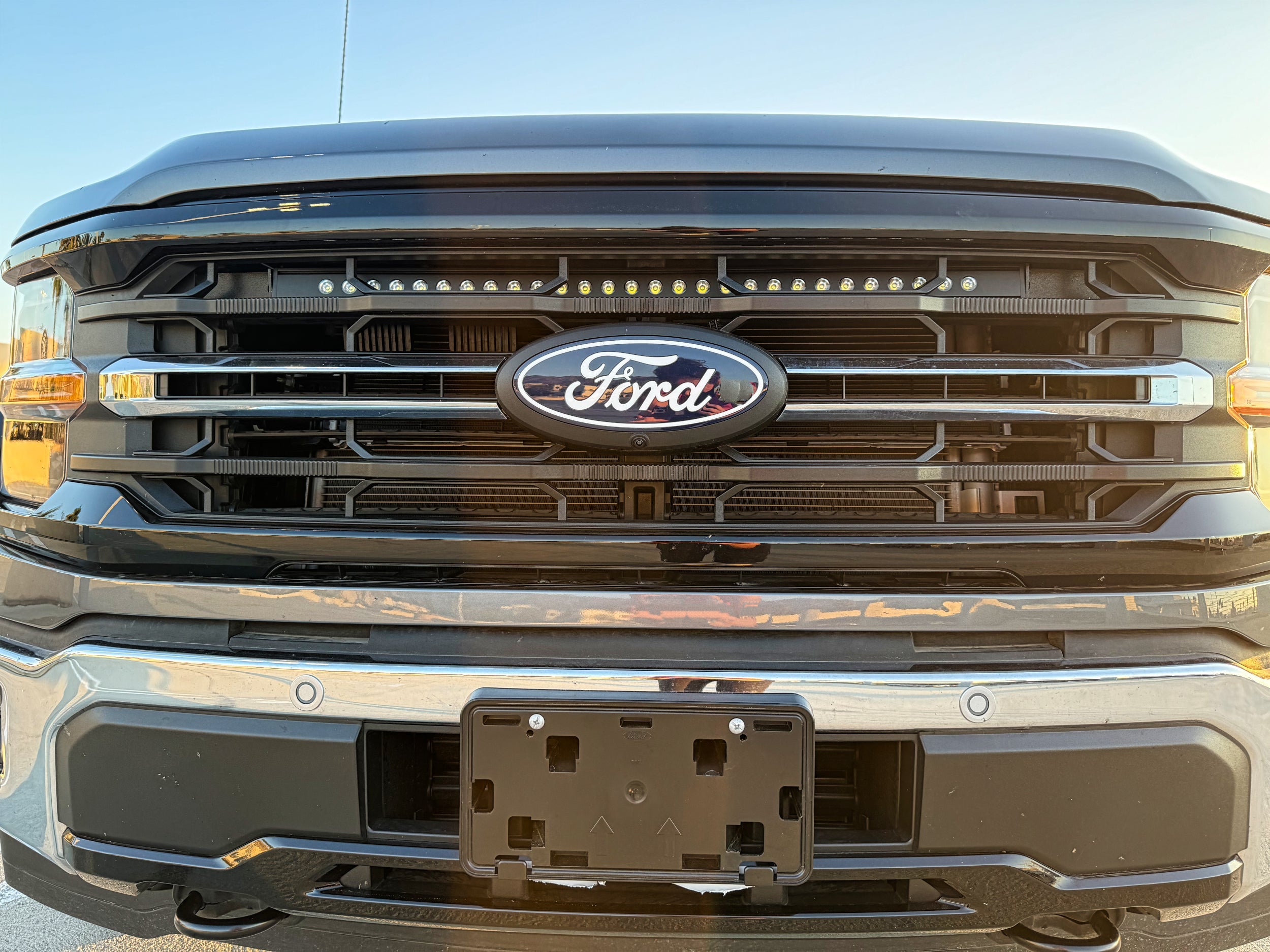 2024+ Ford F150 LightBar front view on grille-less setup ensuring factory openings fitment