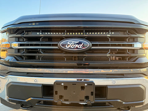 front view 2024 ford f150 grille with led light bar behind grille for off roading