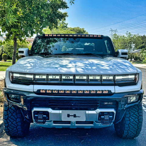 white hummer ev with led light bar bumper amber drl and led light bar roof mount amber drl