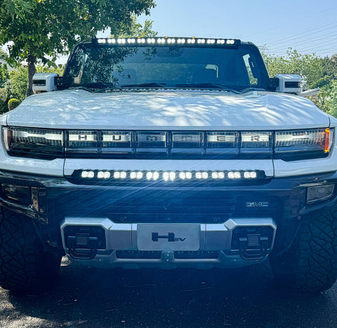 white hummer ev with led light bar bumper white and led light bar roof mount white