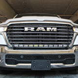 white 2025 ram 1500 with LED light bar on top bumper and fog lights amber