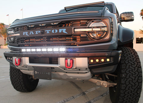 ford bronco raptor with white with led light baron top of bumper m&r automotive