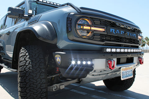  ford bronco raptor with white led light bar on bumper and roof plus fog lights