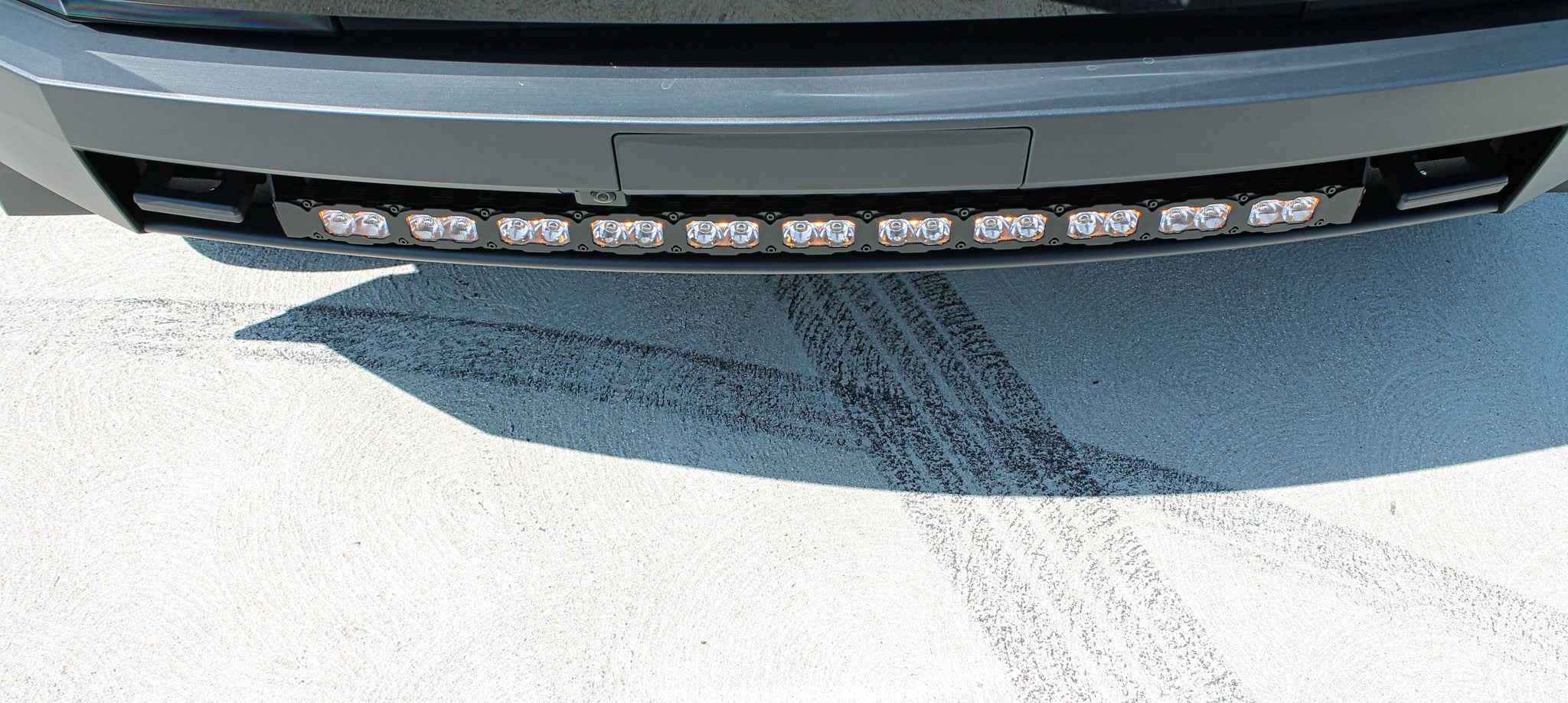 top view black tesla cybertruck with curved LED light bar m&r automotive 