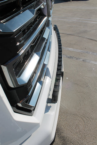 top view of white gmc sierra 2500 3500 HD with a curved LED light bar in front of the grille