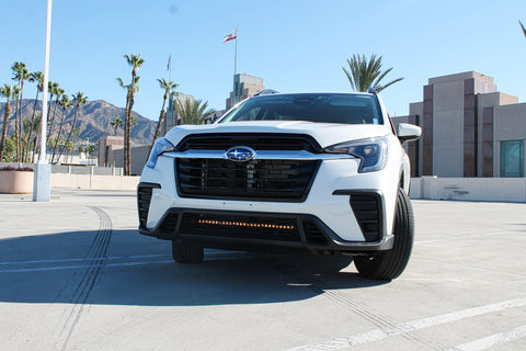 2020 white subaru ascent with amber drl led light bar behind grille