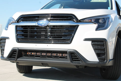 2019 white subaru ascent with led light bar behind grille