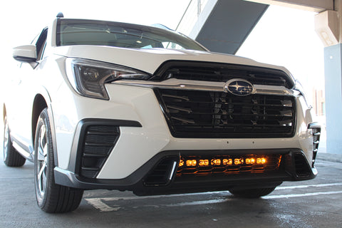 2023 white subaru ascent with amber drl led light bar behind grille