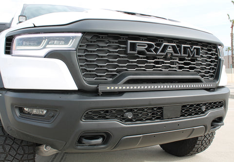 white ram rho with light bar and ditch lights for off roading
