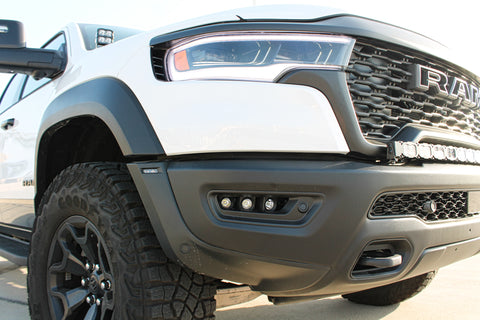 2025 white ram rho side view of the fog light by m&r automotive for off roading