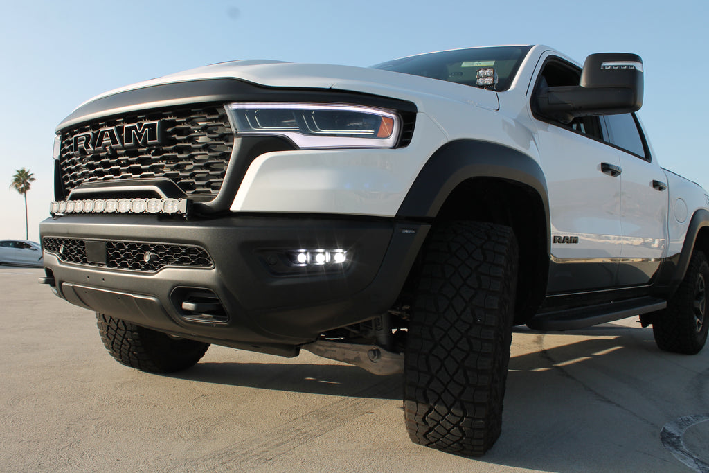 white 2025 ram 1500 rho with fog lights for off roading powerful white light fogs