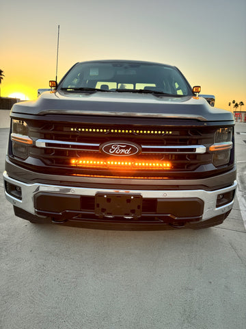 front view 2024 ford f150 with amber led light bar and amber backglow ditch lights