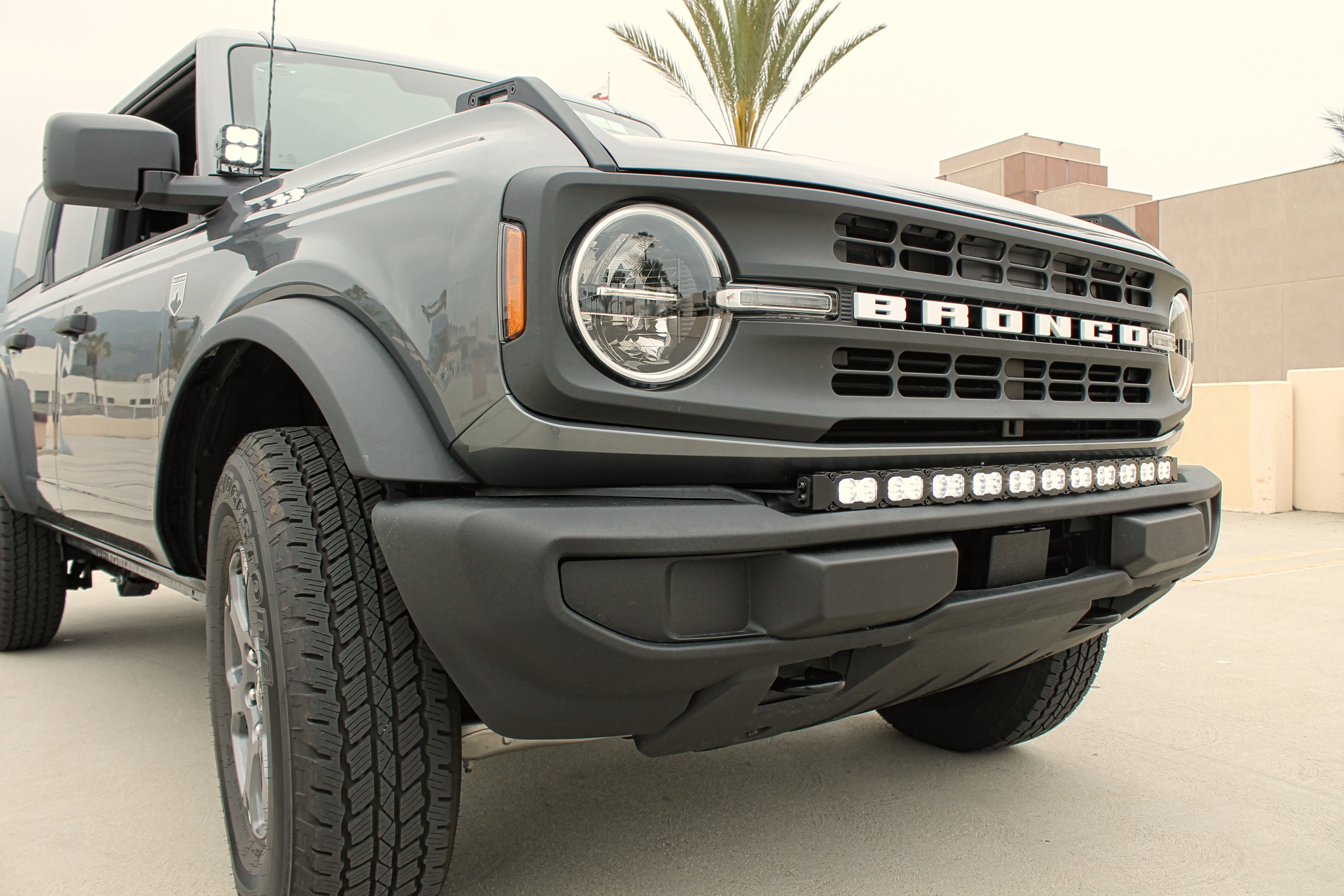 Gray 2024 ford bronco with standard bumper and 40 inch PRO light bar with bright white lights and perfect fitment