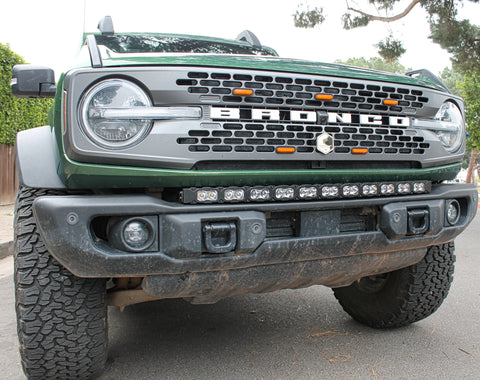 green 2021 bronco capable bumper with led light bar installed on top for off roading