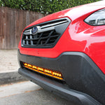 red 2018 subaru crosstrek gen 2 with light bar in lower grille for off roading