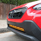 red 2018 subaru crosstrek gen 2 with light bar in lower grille for off roading