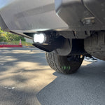 Lexus GX550 Reverse light kit: White LED pod with amber or red backlight option installed on rear bumper for 2024+ GX550 models